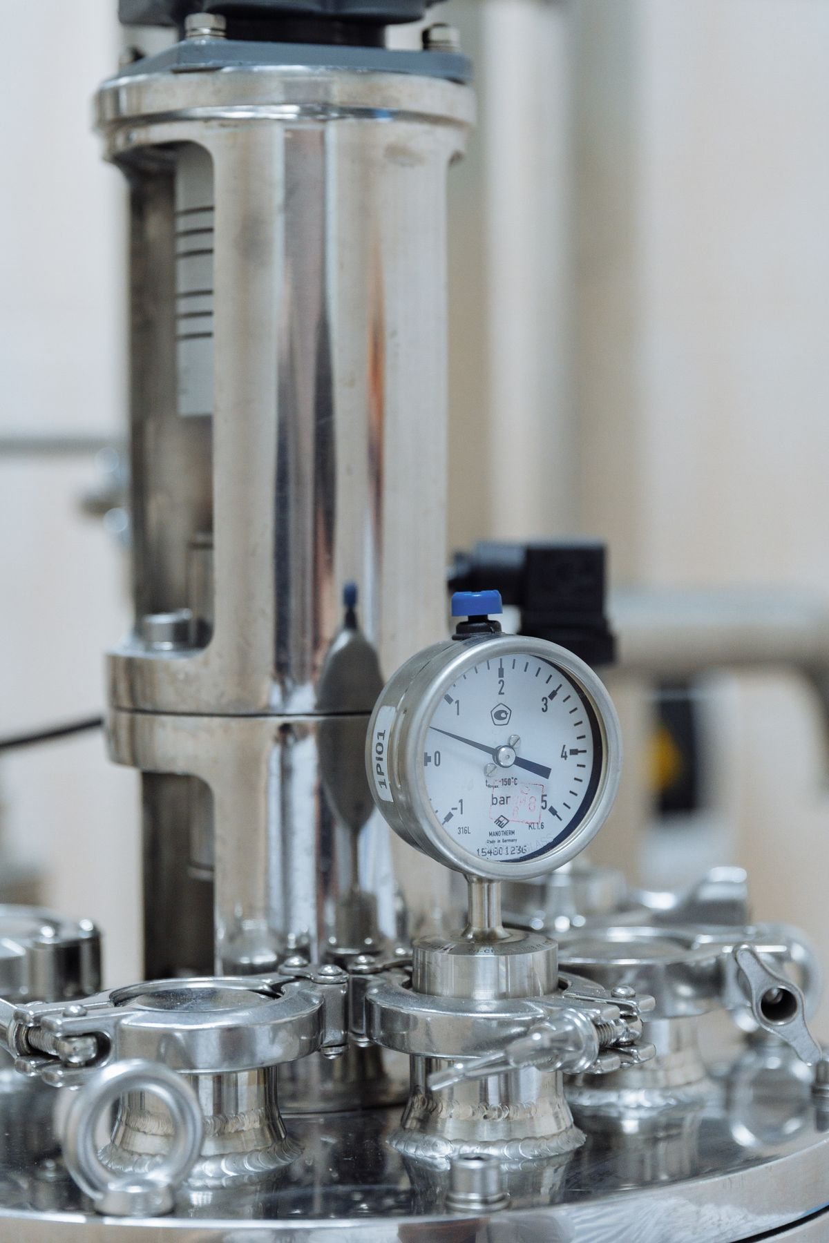 Technician taking an airflow measurement reading with a calibrated instrument